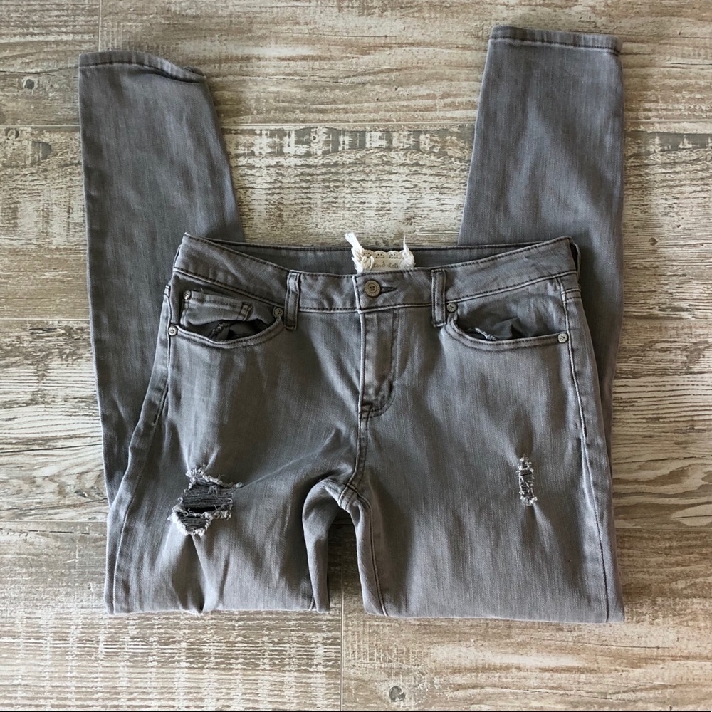 grey ripped jeans